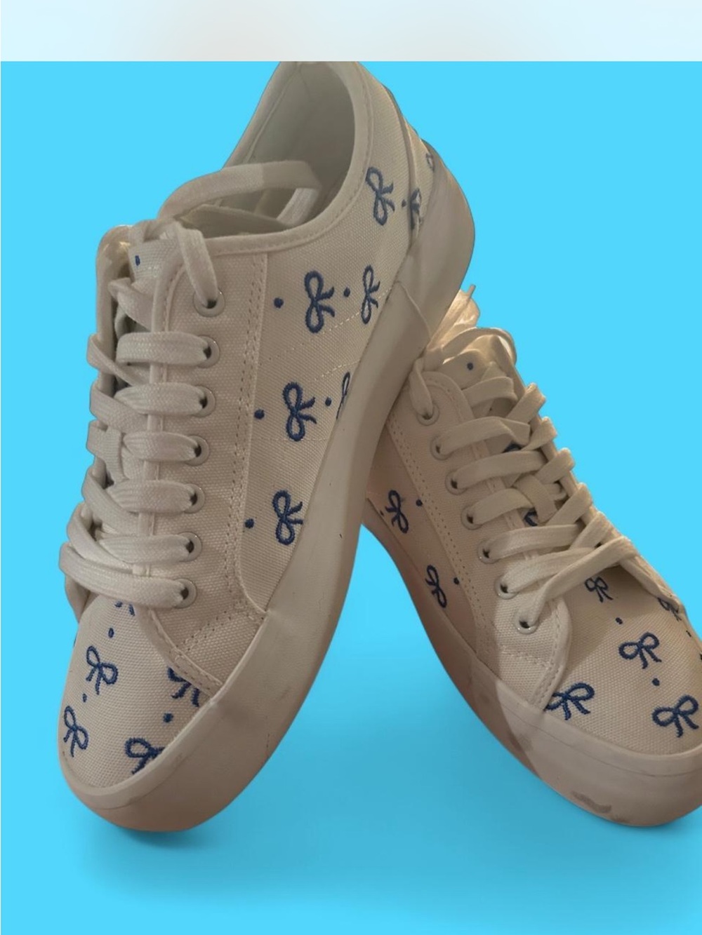 Sincerely Jules Cream Canvas Sneakers with Blue Bow Print